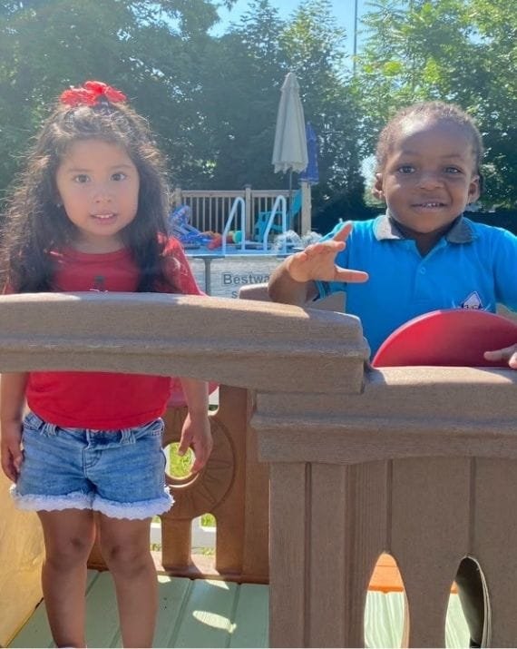 Children enjoying outdoor play at Sweet Angels Daycare