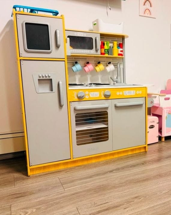 Pretend play kitchen at Sweet Angels Daycare