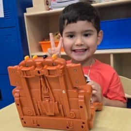 Child learning through play at Sweet Angels Daycare