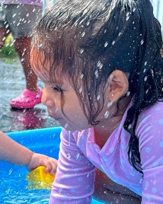 Water play activity at Sweet Angels Daycare