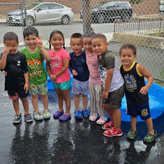 Children enjoying outdoor play at Sweet Angels Daycare & Preschool Center