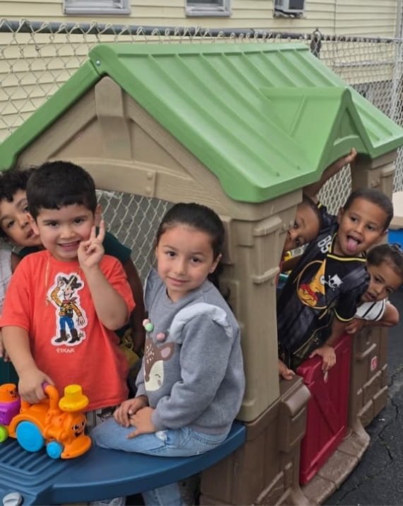 Children playing together at Sweet Angels Daycare in Everett, MA