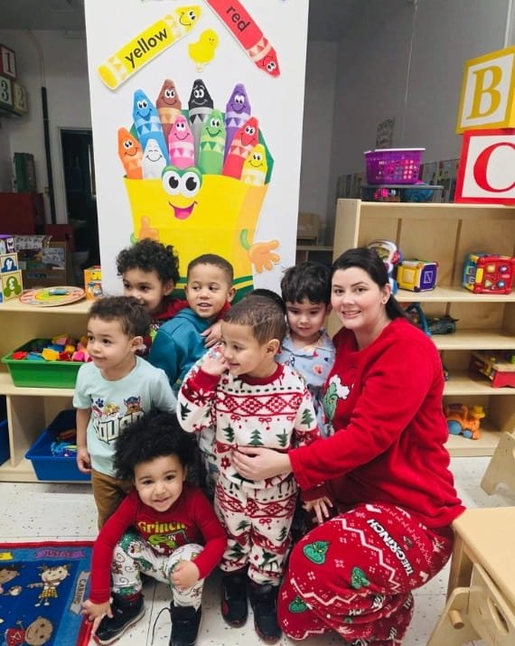 Children and educator together at Sweet Angels Daycare in Everett, MA